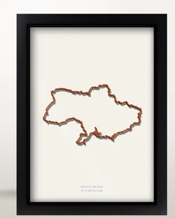 Framed Ukraine country outline poster on a solid beige background